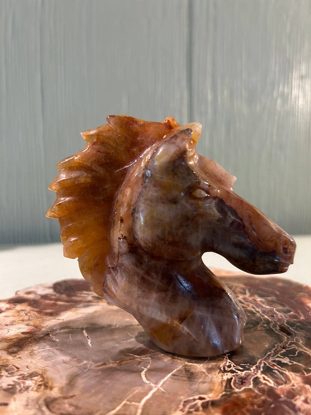 Carved golden healer horse head