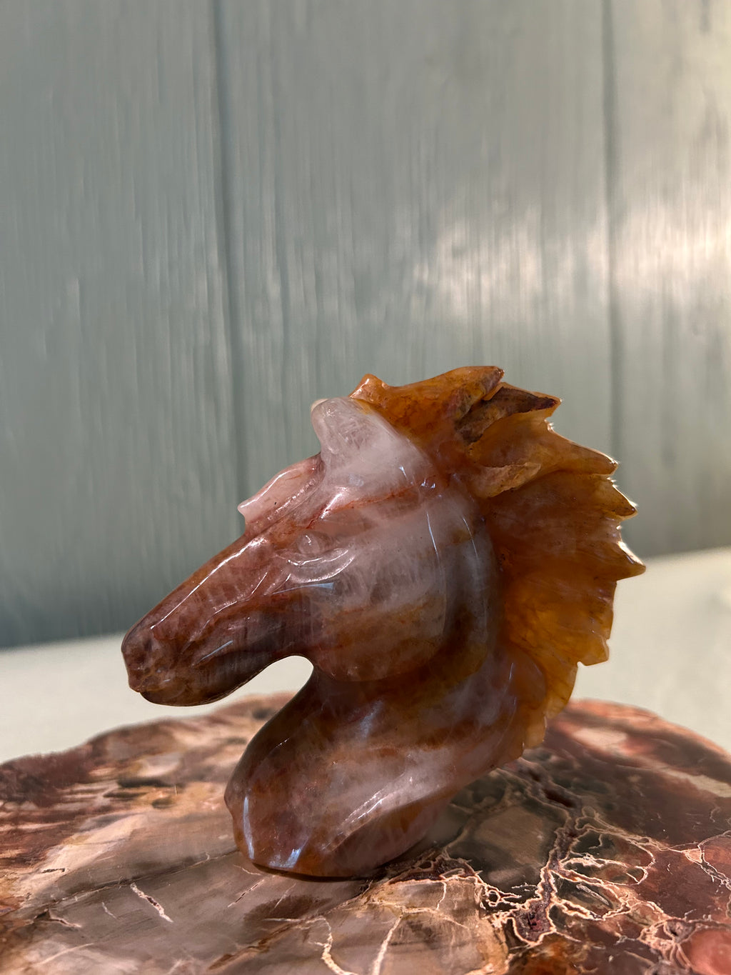 Carved golden healer horse head