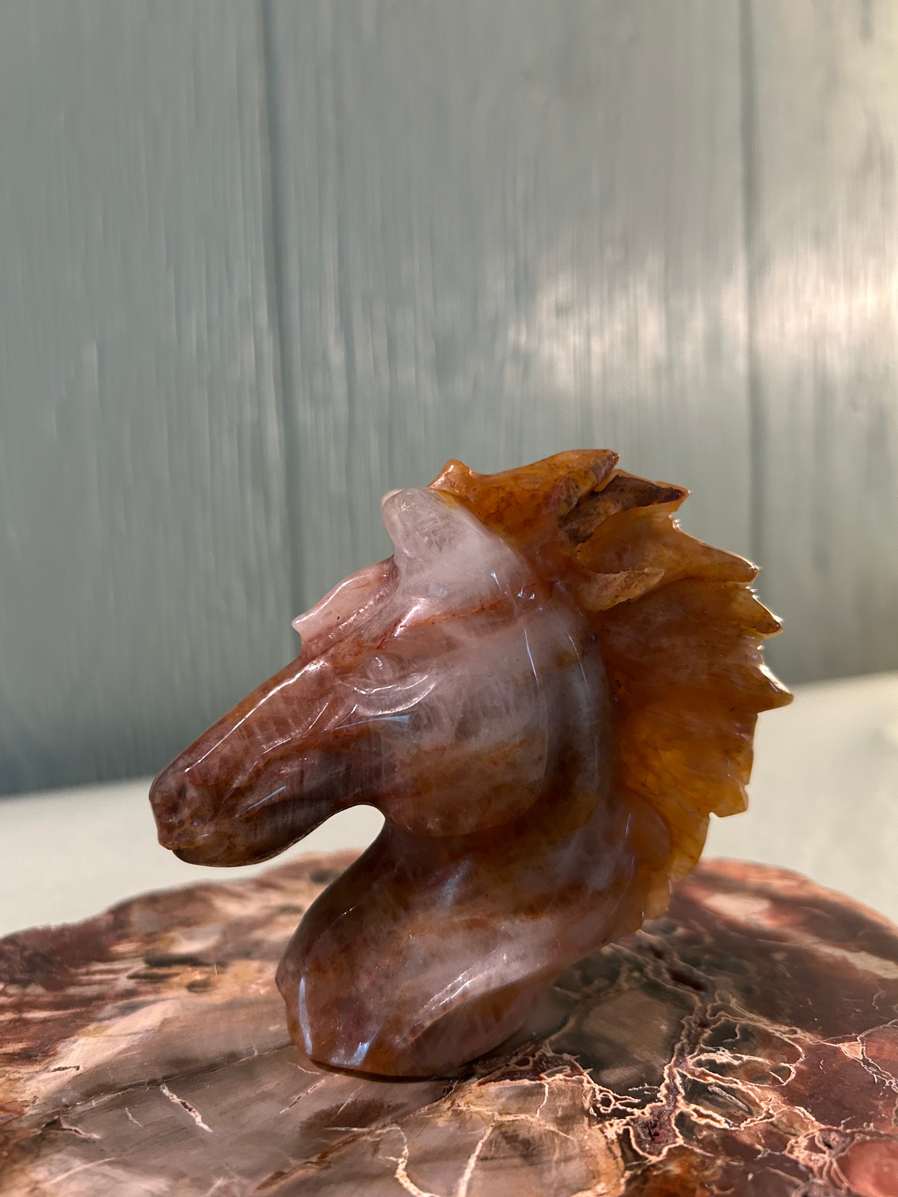 Carved golden healer horse head