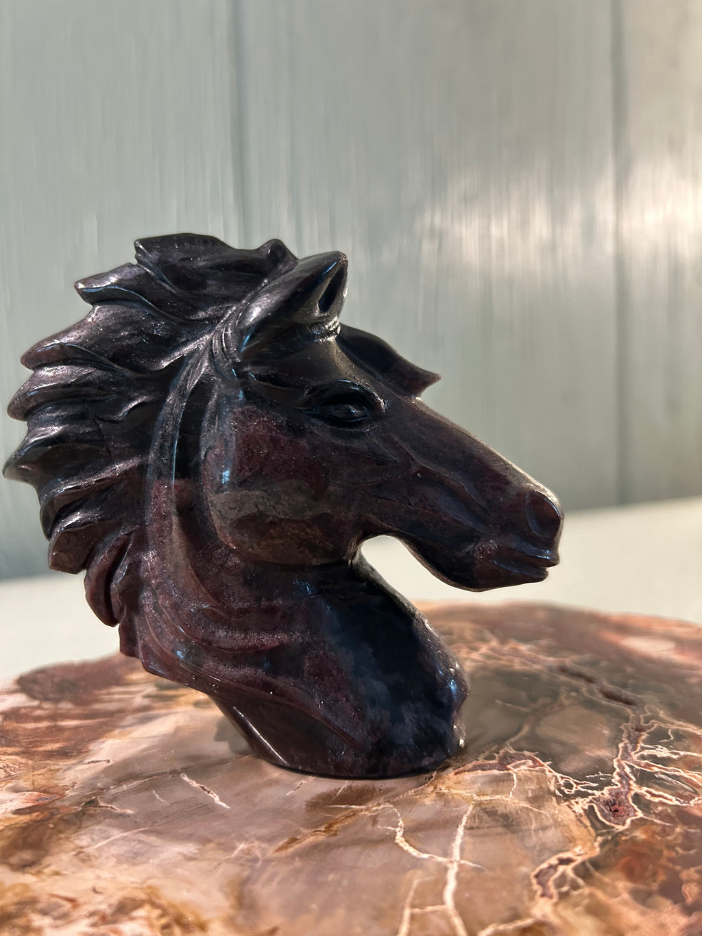 Carved garnet horse head