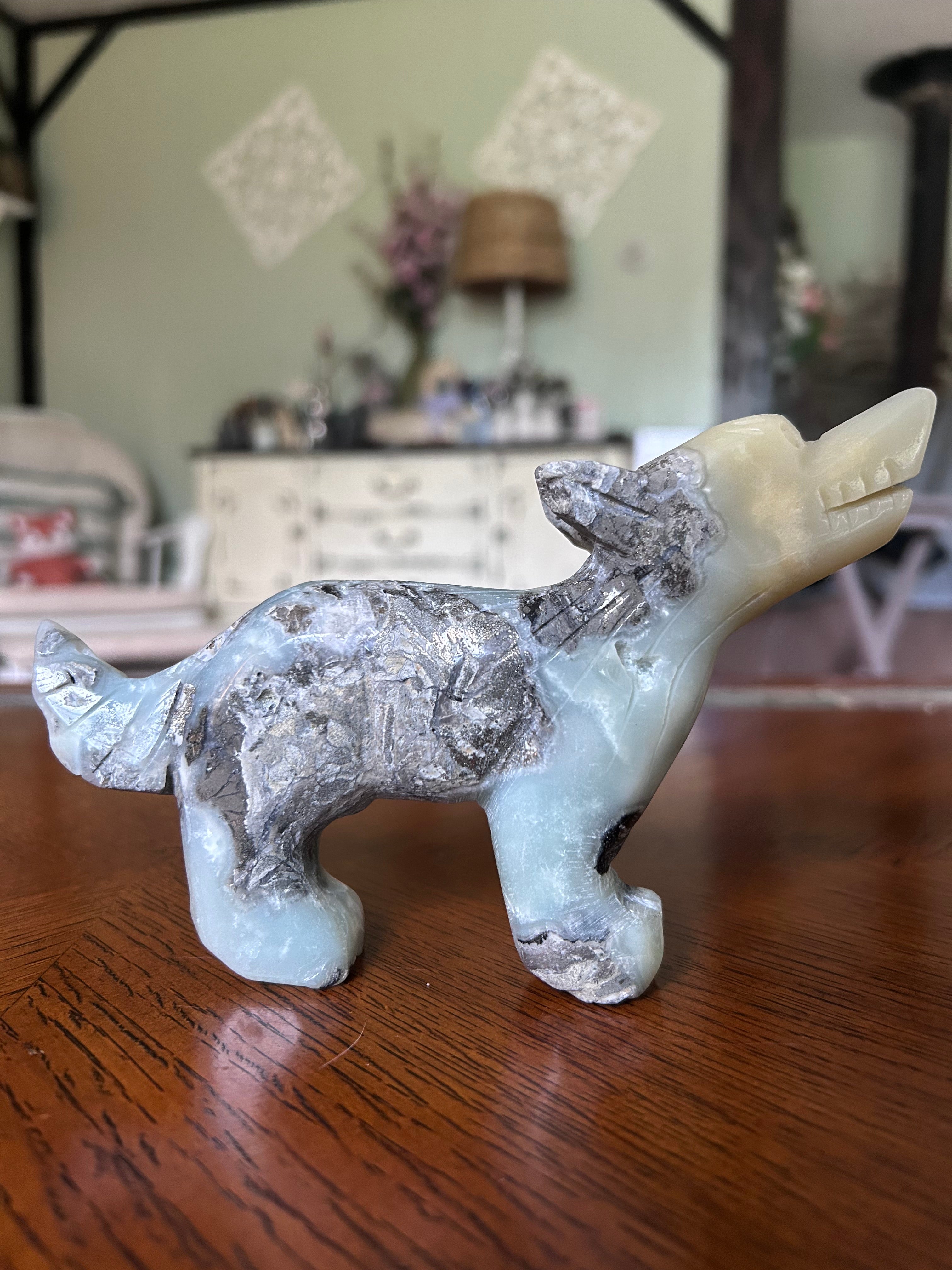 Caribbean calcite mixed with pyrite Wolf carving